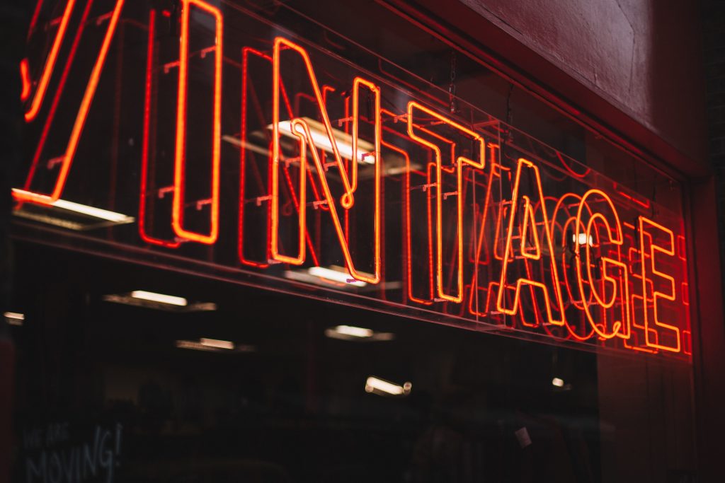 image of a sign that says vintage, eco friendly interior design, sustainable interior design, eco-friendly design